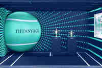 Tiffany & Co at US Open
Tiffany & Co. unveils new 2025 US Open Pop-up with novel design, featuring iconic trophies and unique HardWear by Tiffany tennis racket.
 Tiffany & Co at US Open
Tiffany & Co. unveils new 2025 US Open Pop-up with novel design, featuring iconic trophies and unique HardWear by Tiffany tennis racket.