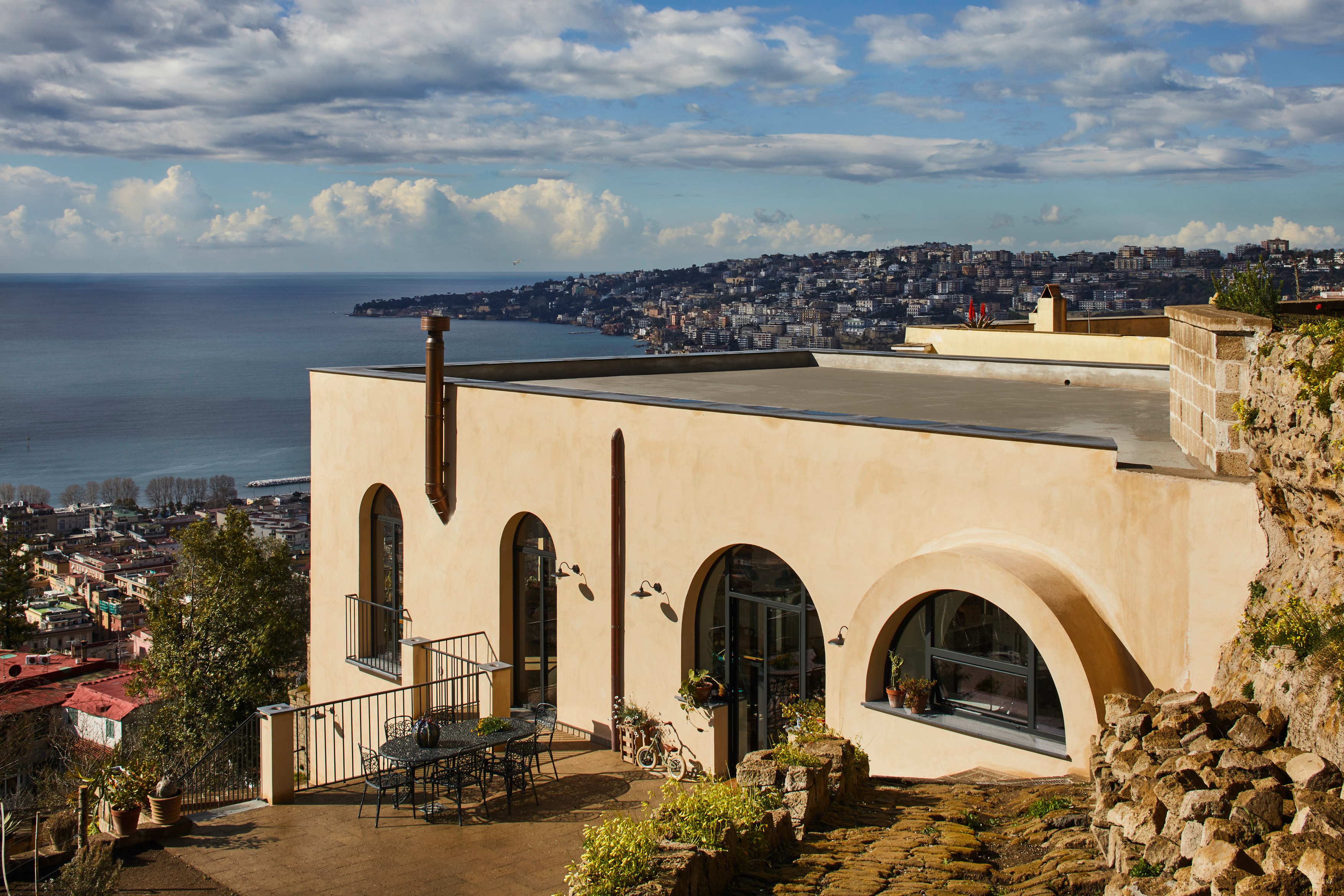 Young family transforms monastery ruins in the heart of Naples into stunning home